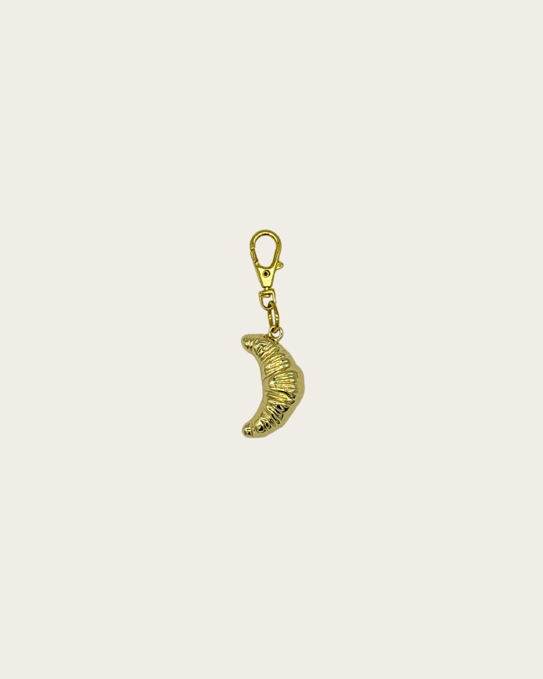Schlüsselanhänger: Croissant Gold